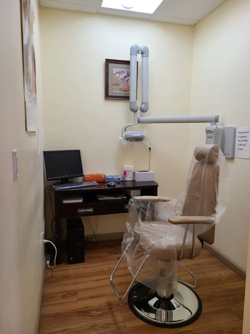 A Dental Office With a Computer Screen